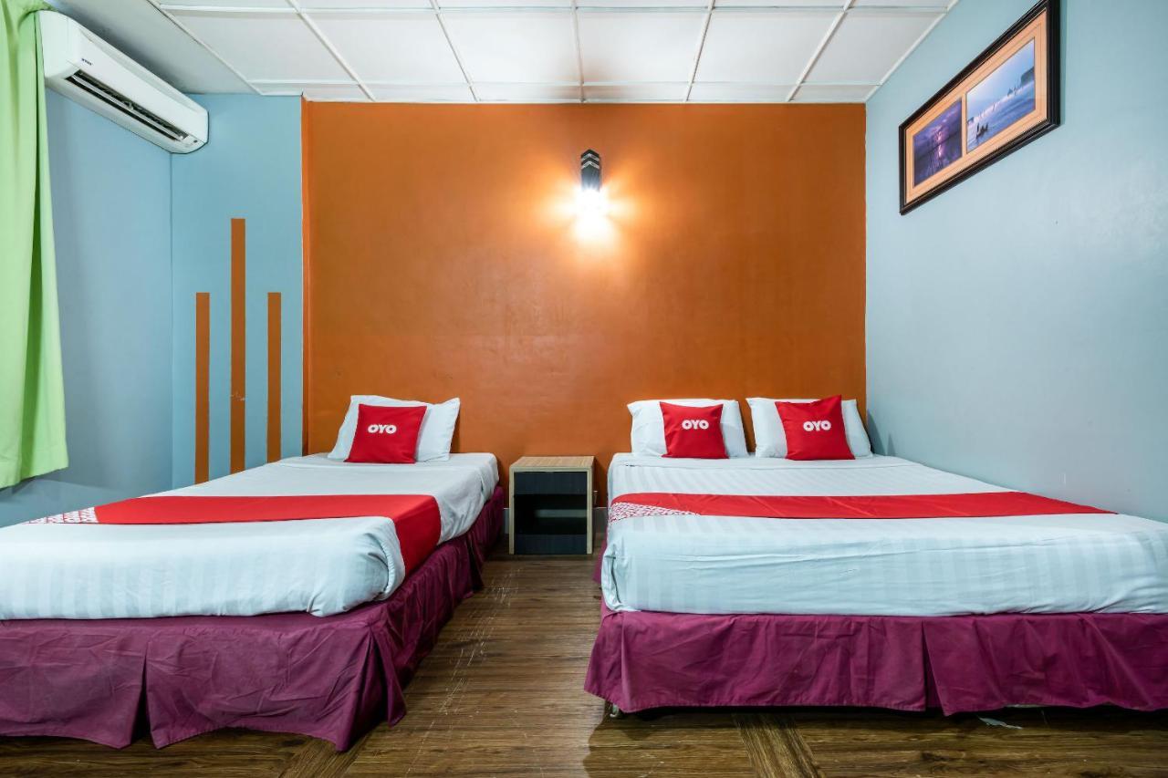טאוואו Oyo 89997 Kurnia Hotel מראה חיצוני תמונה